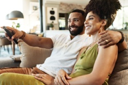 A couple watching TV.