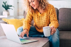 A woman working at her computer.