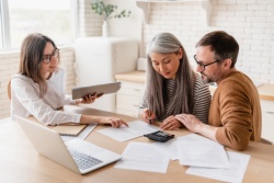 A couple working with their financial planner.