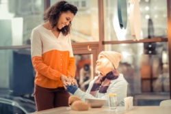 A woman being kind to another woman.