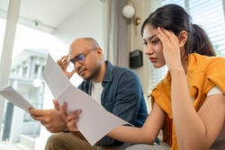 A couple reviewing paperwork.